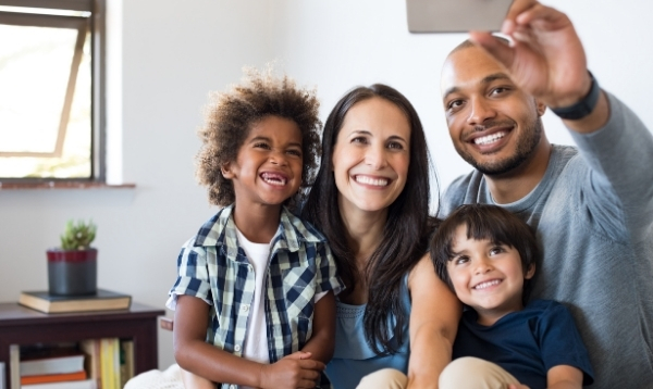 bi-racial family taking a selfie