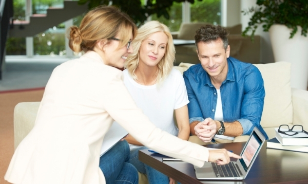 insurance agent with young couple