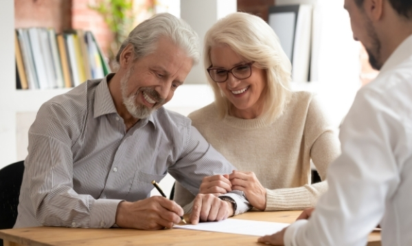 insurance agent with older couple